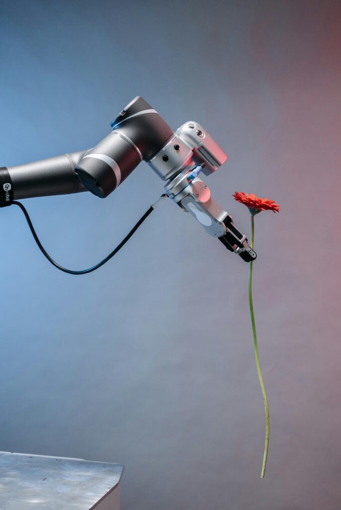 robot holding flower