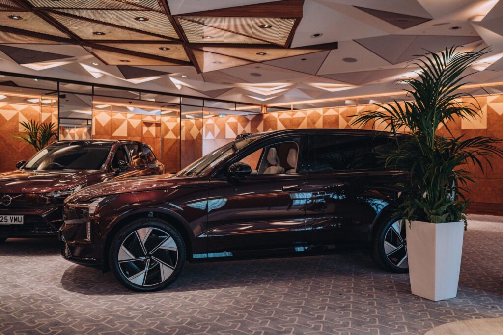 Volvo EX90 electric SUV on display at The Berkeley during Volvo’s Power and Pause event, showcasing luxury design and modern EV styling.