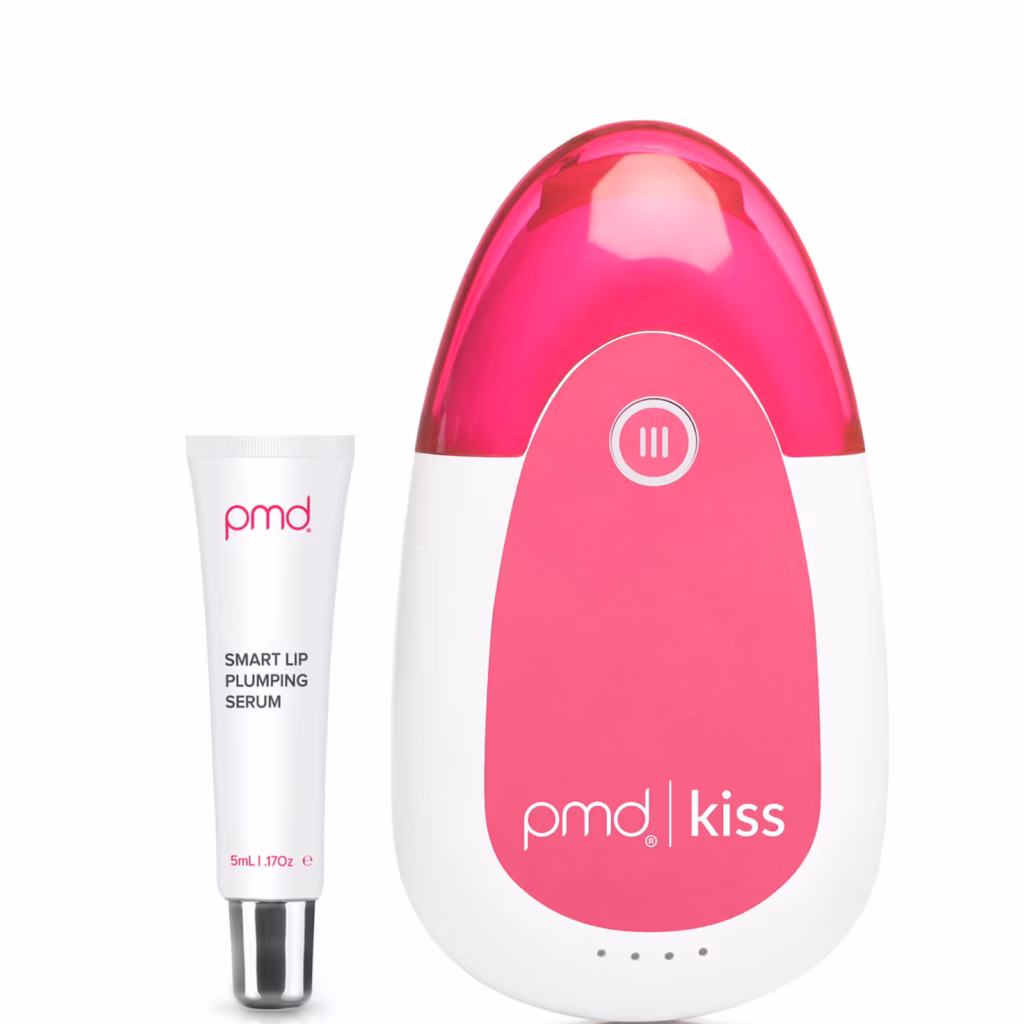 Image of the PMD Kiss Lip Plumping System including the pink-and-white handheld device and the Smart Lip Plumping Serum tube.