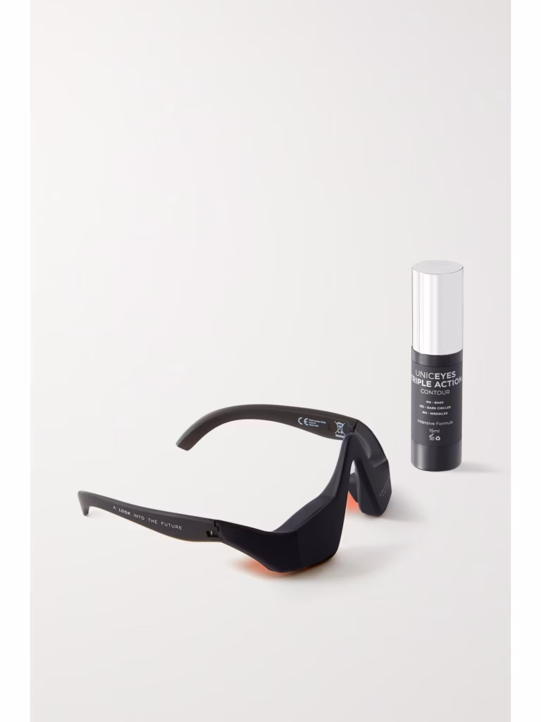 Image of the UNICSKIN Advanced Eyecare Duo featuring a black LED microcurrent eye mask and a bottle of Uniceyes Triple Action Contour Serum against a clean white background.