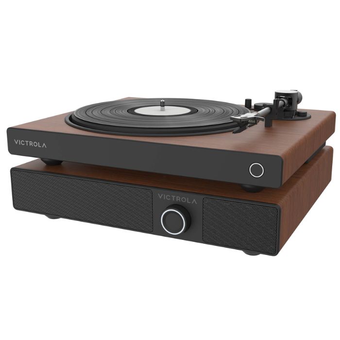 Victrola Soundstage all-in-one turntable and speaker system with wood finish, designed for vinyl playback with integrated high-quality audio output.