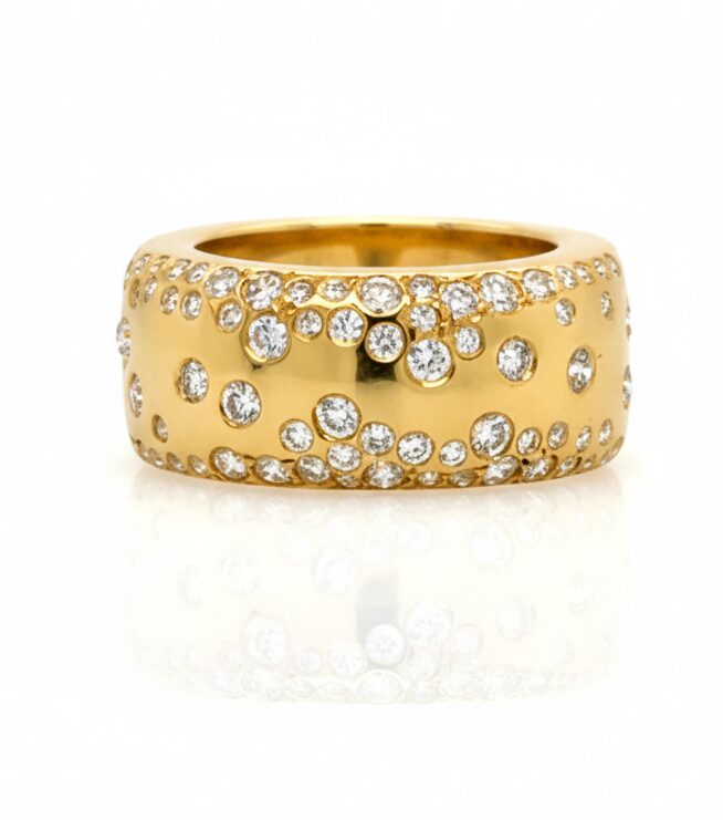 Solid gold smart ring jacket with scattered diamonds by 24KT Concierge, designed to fit over an Oura Ring and elevate wearable health technology into fine jewelry.