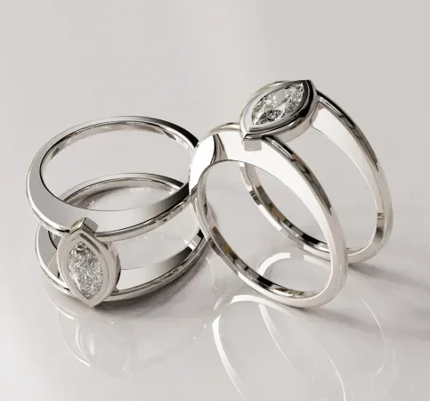 Sterling silver smart ring jacket with north-to-south marquise-cut gemstone, handcrafted to fit Oura and other smart rings while preserving health-tracking performance.