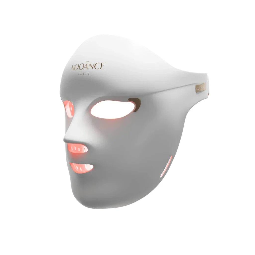Packshot of the Nooānce Paris Elite X600 LED Face Mask in white, a professional-grade beauty tech device using red and near-infrared light therapy for skin rejuvenation.